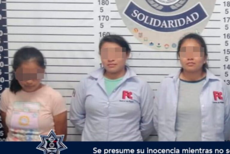 Aseguran a dos hombres que arrebataron radio de comunicación a policía de Playa del Carmen